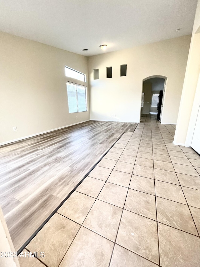 empty room with light wood-type flooring