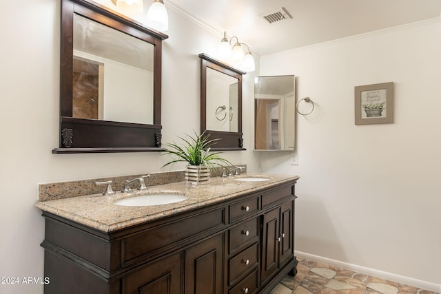 bathroom featuring vanity and crown molding