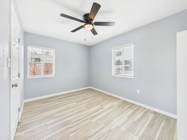 2628 W Marshall Ave, Phoenix, AZ 85017 - unfurnished room featuring baseboards, light wood-type flooring, and ceiling fan