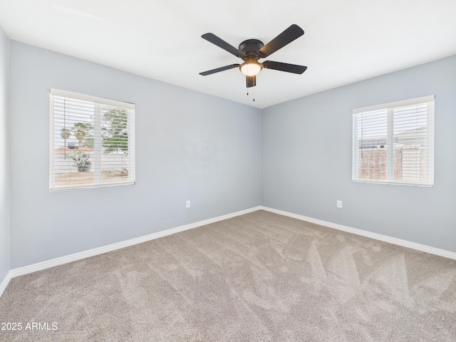 2628 W Marshall Ave, Phoenix, AZ 85017 - carpeted spare room featuring ceiling fan and baseboards