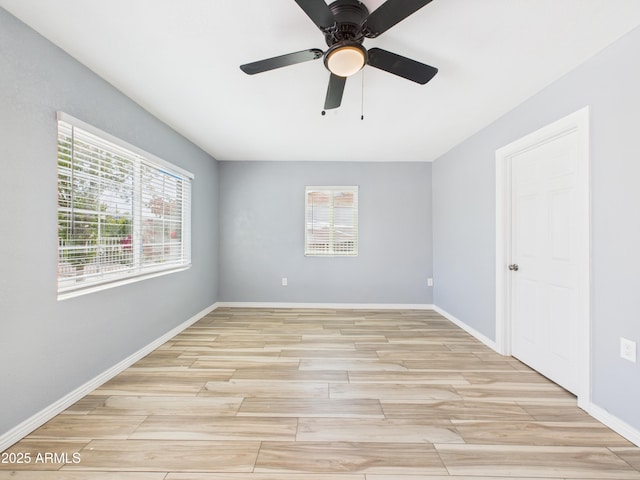 2628 W Marshall Ave, Phoenix, AZ 85017 - unfurnished room with light wood-style flooring, baseboards, and a ceiling fan