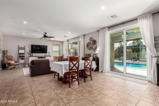 dining room featuring light tile patterned floors, visible vents, a ceiling fan, and recessed lighting