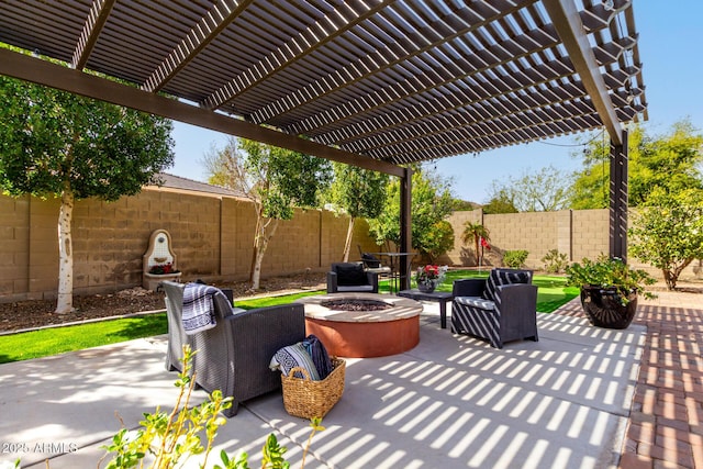 view of patio with a fenced backyard, a fire pit, and a pergola