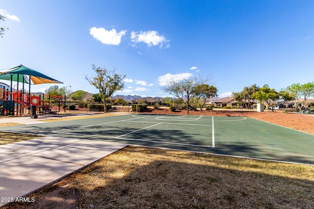 exterior space with community basketball court and playground community