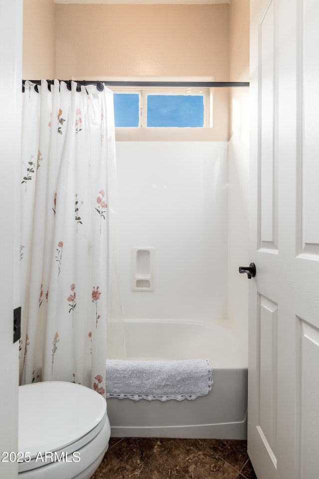 full bath with shower / bath combo and toilet