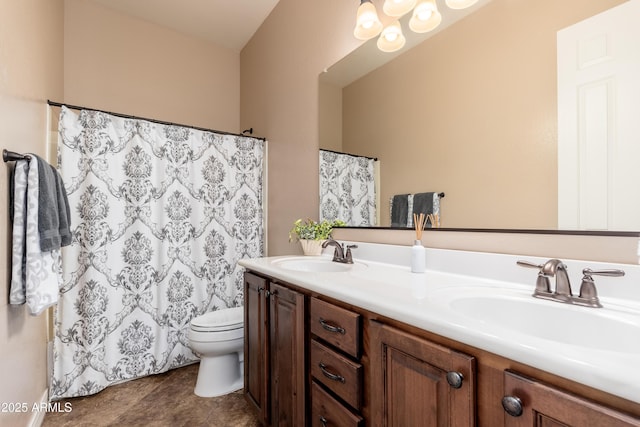 full bath featuring double vanity, toilet, curtained shower, and a sink