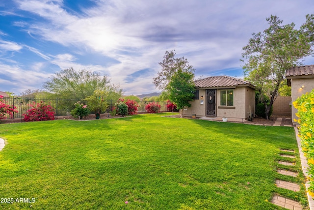 view of yard with a fenced backyard