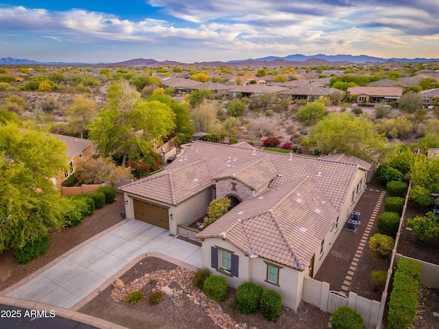 aerial view with a mountain view and a residential view