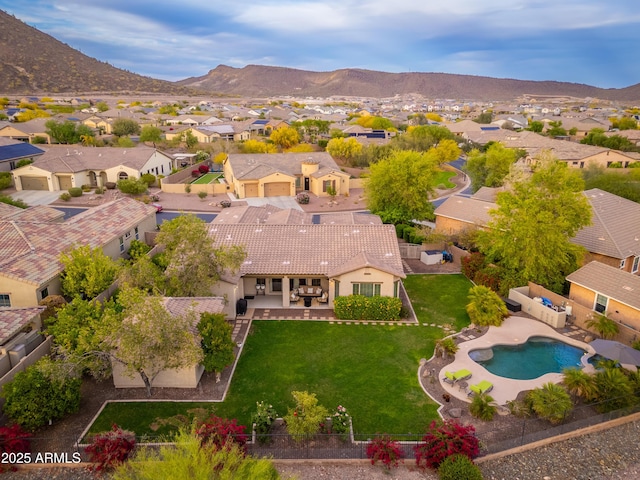 aerial view with a mountain view and a residential view