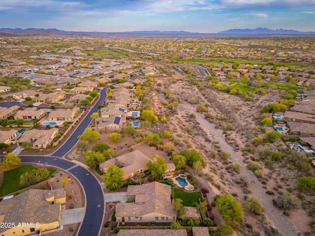 bird's eye view featuring a residential view and a mountain view