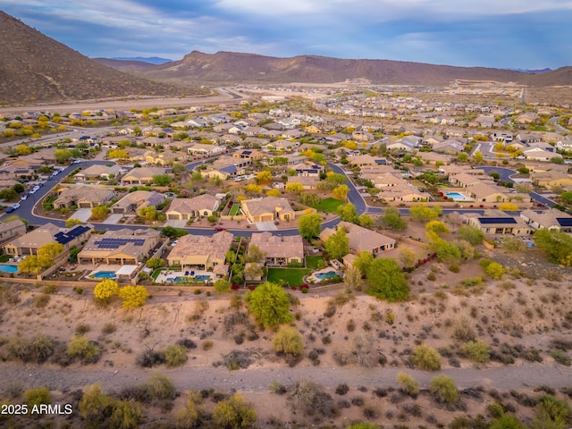 drone / aerial view featuring a mountain view and a residential view