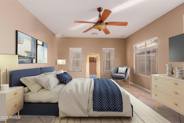 bedroom with light tile patterned floors and ceiling fan