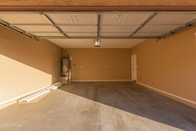 garage featuring a garage door opener and water heater