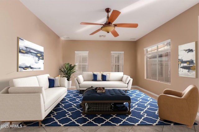 tiled living room featuring ceiling fan