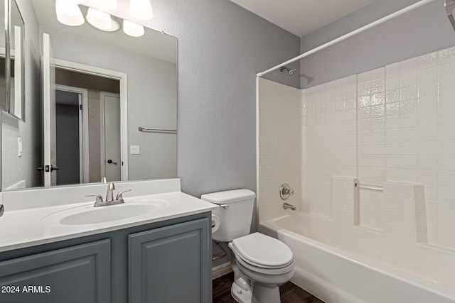 full bathroom featuring shower / washtub combination, vanity, and toilet