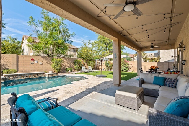 view of patio featuring ceiling fan, a fenced backyard, and an outdoor living space