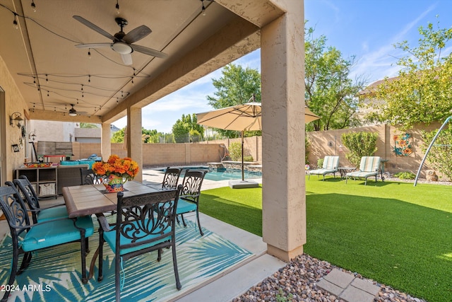 view of patio / terrace with a ceiling fan, a fenced in pool, a fenced backyard, outdoor dining area, and outdoor lounge area