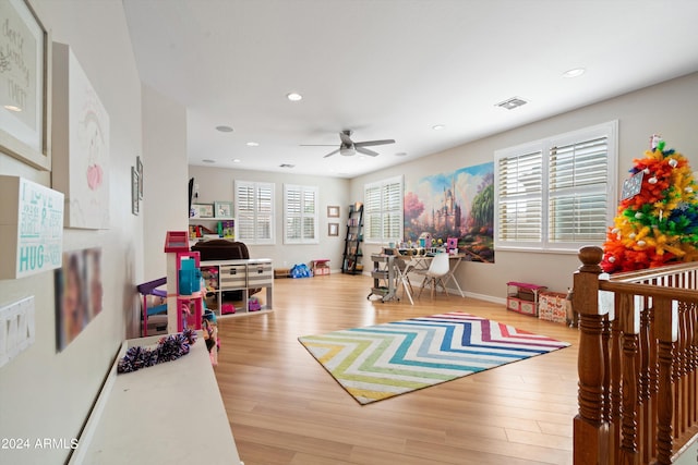 playroom with baseboards, visible vents, a ceiling fan, light wood-type flooring, and recessed lighting