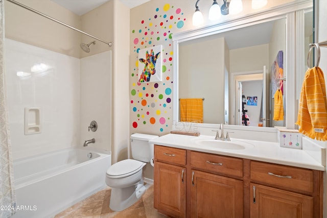 bathroom featuring washtub / shower combination, toilet, tile patterned flooring, and vanity