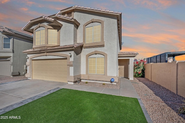 view of front of property with a garage