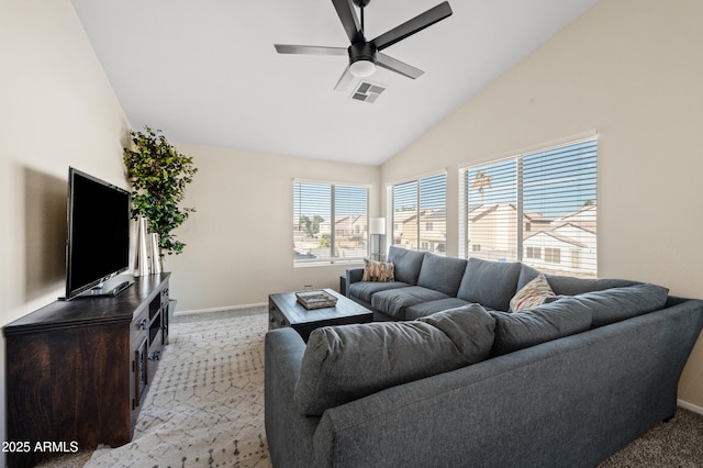 carpeted living room featuring ceiling fan and lofted ceiling