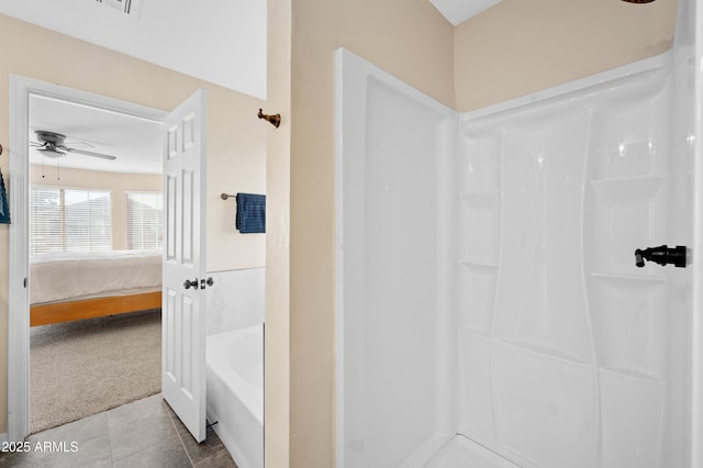 bathroom featuring ceiling fan, tile patterned flooring, and walk in shower