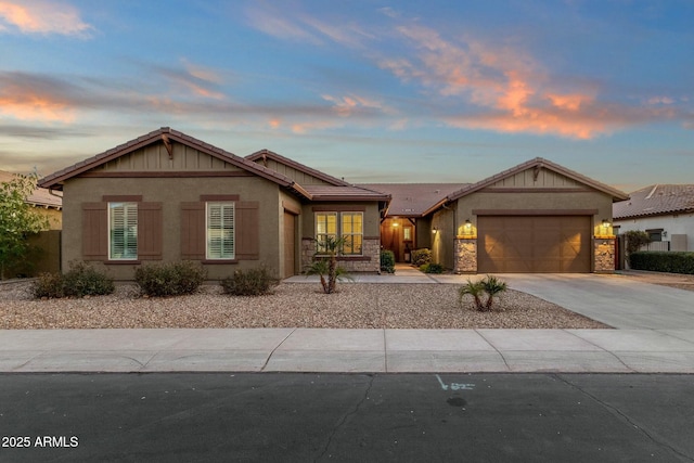 view of front of home with a garage