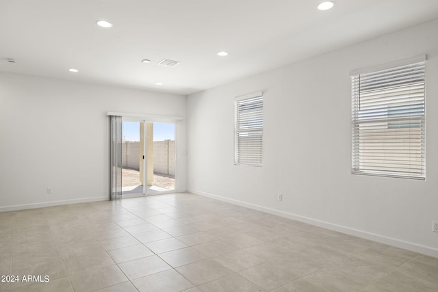 view of tiled spare room