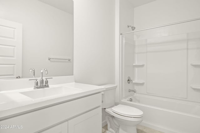 full bathroom with bathtub / shower combination, vanity, and toilet