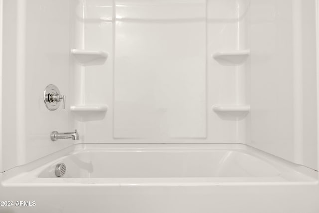 bathroom with shower / bath combination