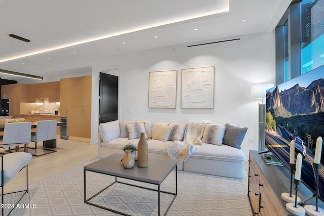 living room with light hardwood / wood-style floors