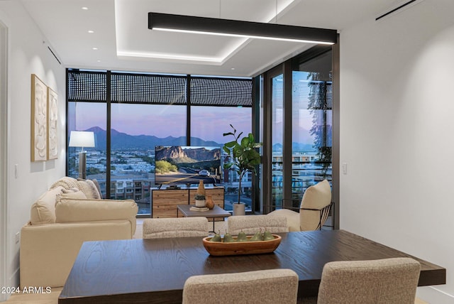 living room with floor to ceiling windows