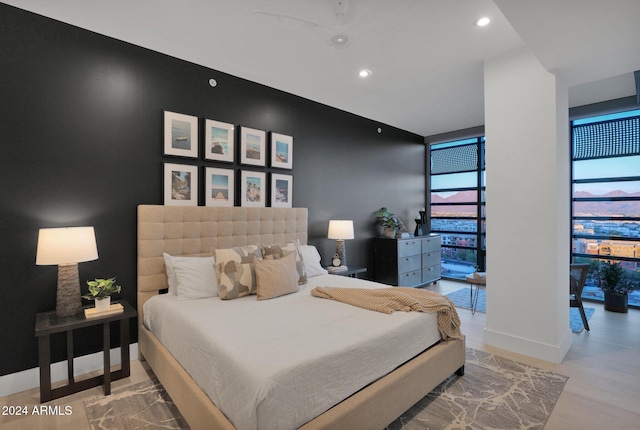 bedroom with light wood-type flooring