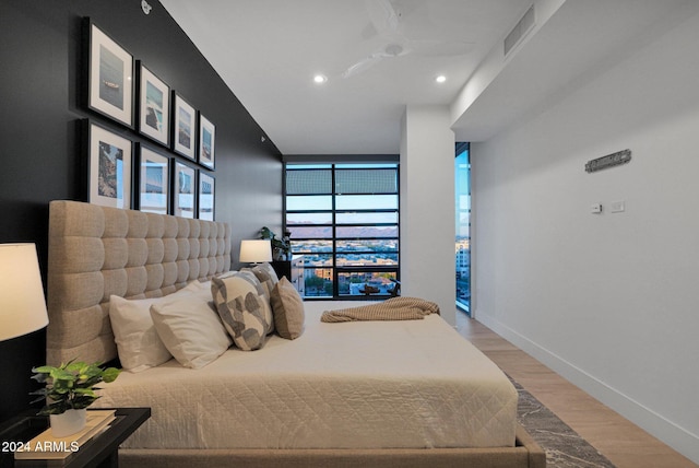 bedroom featuring light wood-type flooring