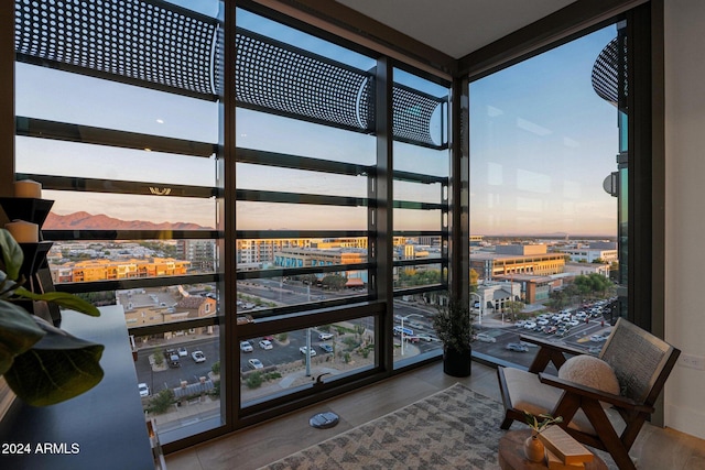 interior space with a wall of windows