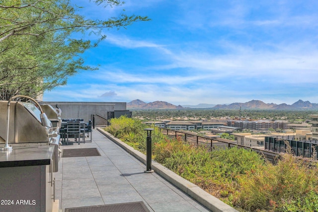 view of patio with a mountain view