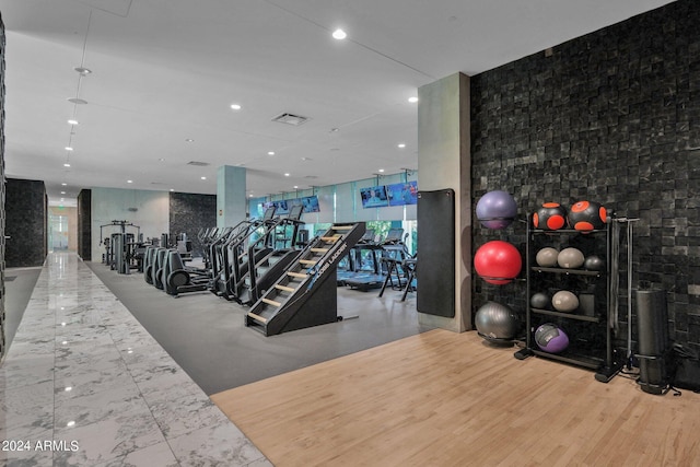 workout area featuring wood-type flooring