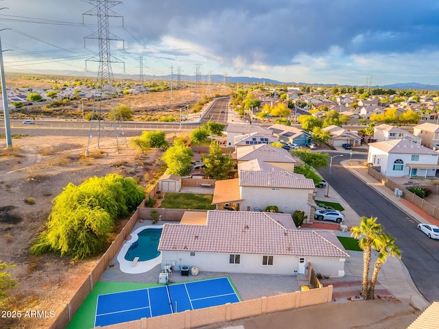 aerial view with a mountain view and a residential view