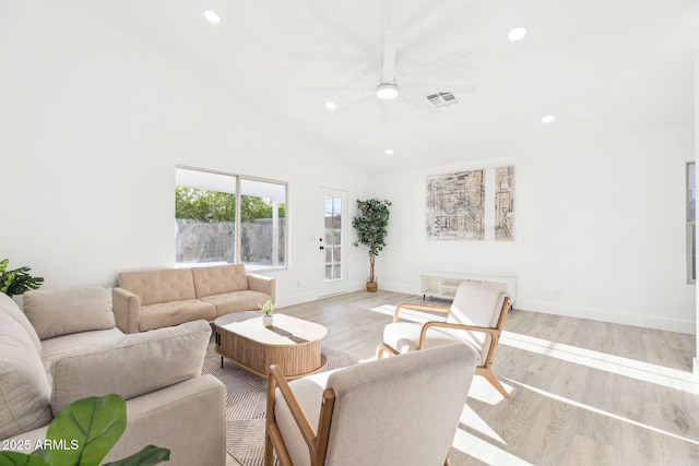 living area with light wood-style floors, a ceiling fan, recessed lighting, lofted ceiling, and visible vents