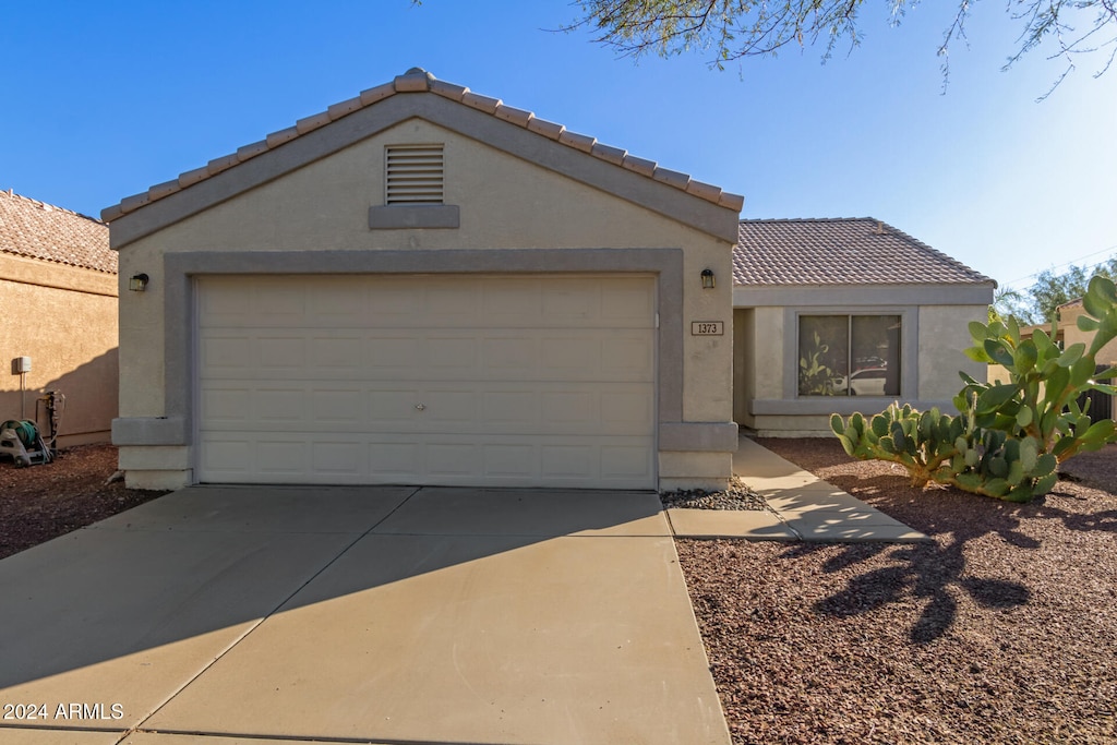 view of front of house with a garage