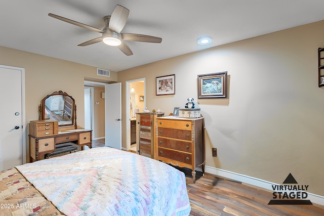 bedroom with wood-type flooring and ceiling fan