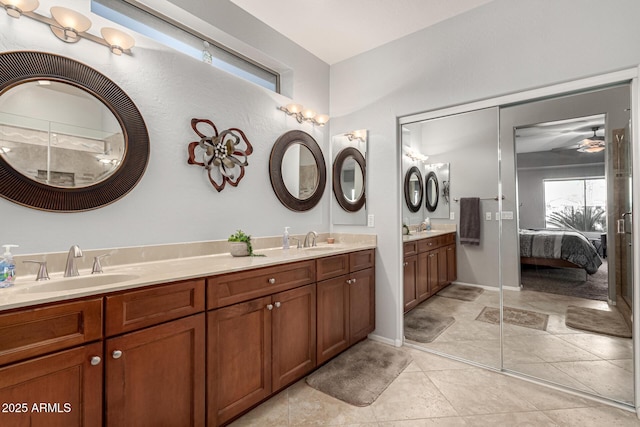 bathroom with vanity and tile patterned floors