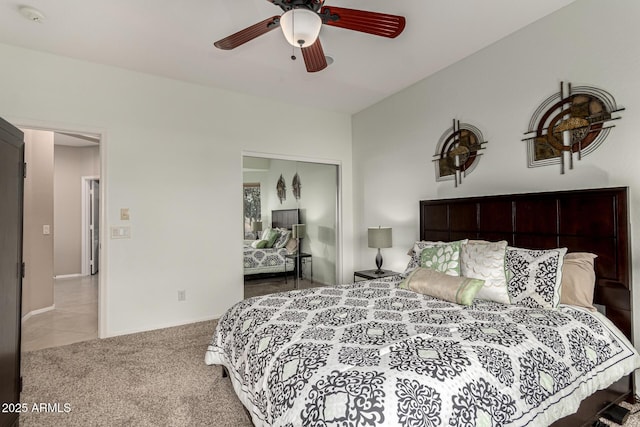 carpeted bedroom with ceiling fan