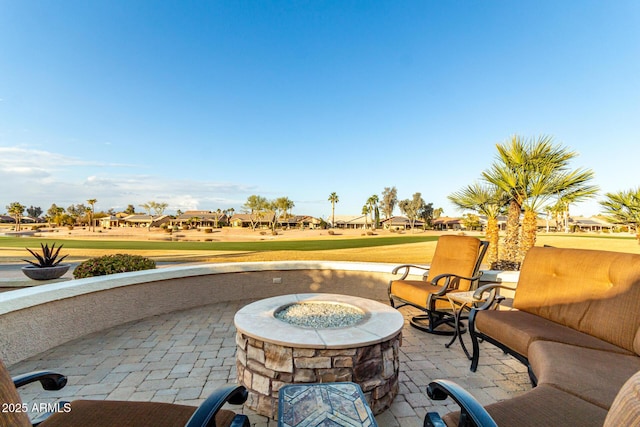 view of patio / terrace with an outdoor fire pit