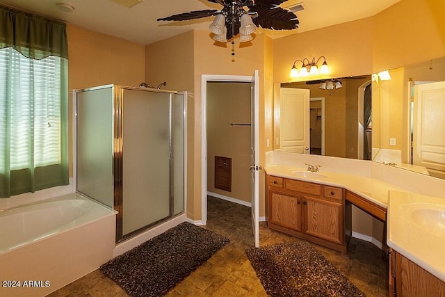 bathroom with vanity, ceiling fan, and plus walk in shower