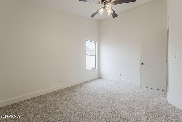 empty room featuring baseboards, a ceiling fan, and carpet flooring