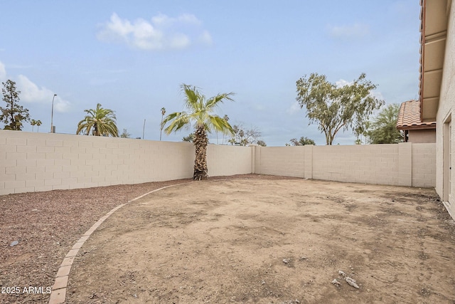 view of yard featuring a fenced backyard