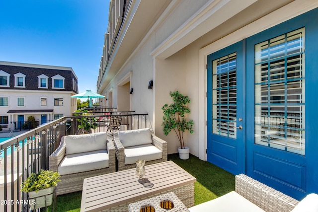4438 N 27th St Unit 27, Phoenix, AZ 85016 - balcony featuring french doors and an outdoor living space