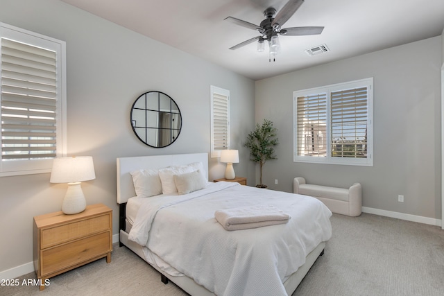 4438 N 27th St Unit 27, Phoenix, AZ 85016 - bedroom with baseboards, multiple windows, carpet flooring, and ceiling fan