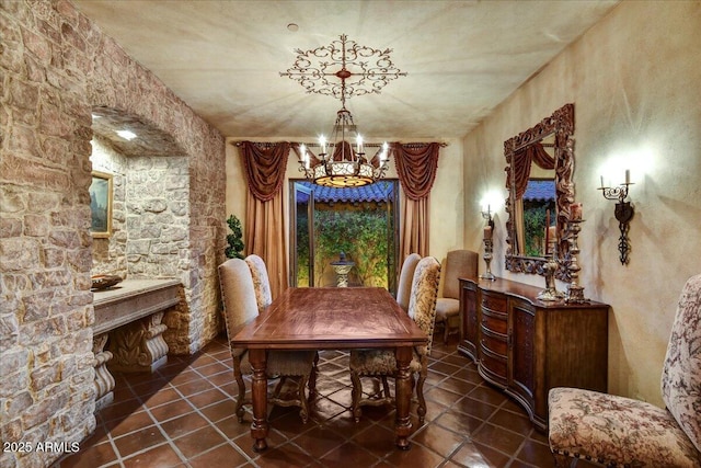 7710 E Golden Eagle Cir, Gold Canyon, AZ 85118 - dining area featuring a chandelier and tile patterned flooring
